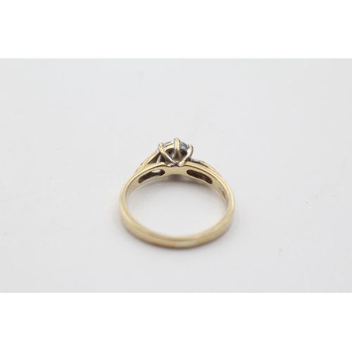 142 - 9ct gold diamond solitaire dress ring with shoulder accents (2.1g) size  K