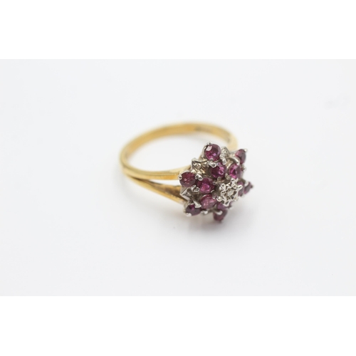 143 - 18ct gold vintage diamond & ruby starburst cluster ring (4.5g) size  M