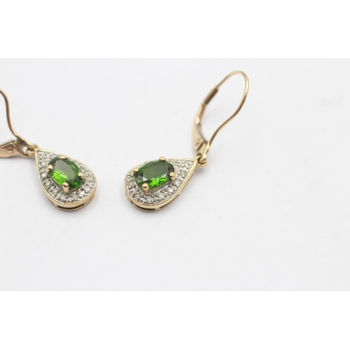 145 - 9ct gold paired diamond and peridot, drop earrings (2.1g)