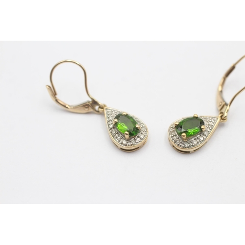 145 - 9ct gold paired diamond and peridot, drop earrings (2.1g)