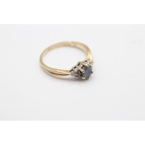 174 - 9ct gold diamond and sapphire dress ring (1.7g) size  K