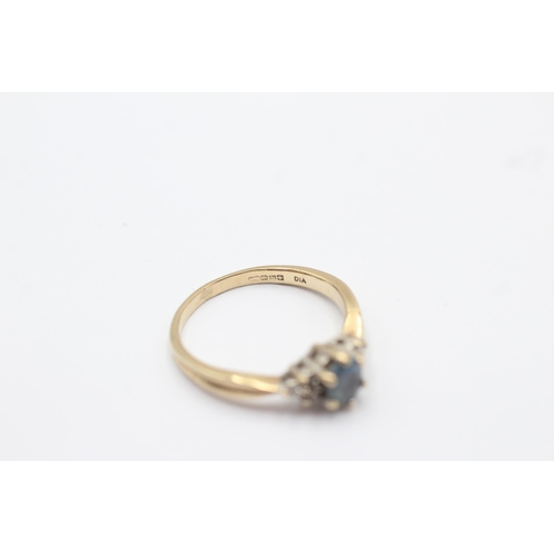 174 - 9ct gold diamond and sapphire dress ring (1.7g) size  K