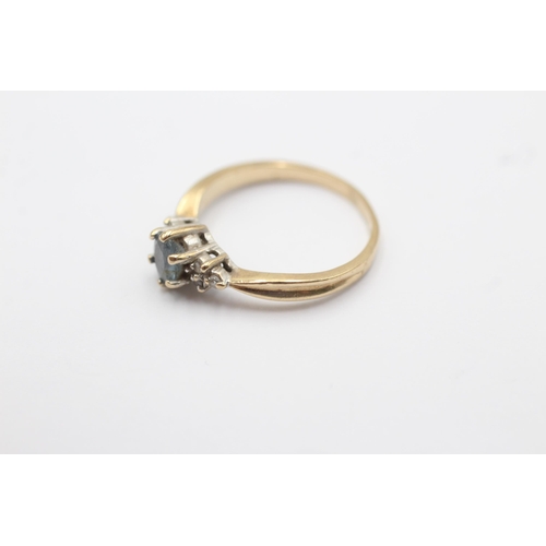 174 - 9ct gold diamond and sapphire dress ring (1.7g) size  K