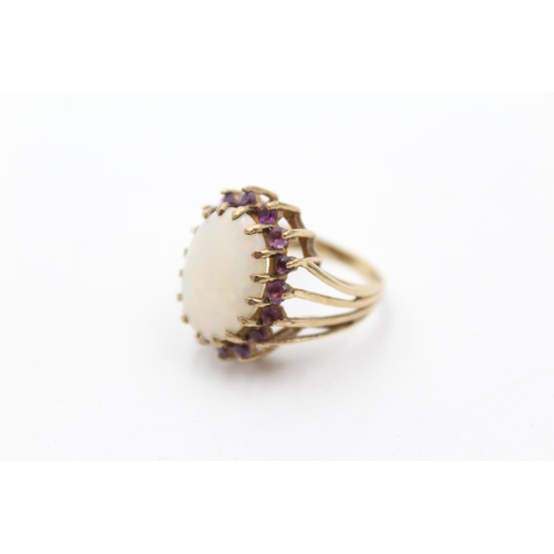 194 - 9ct gold antique opal & amethyst claw set ring (6g) size  M