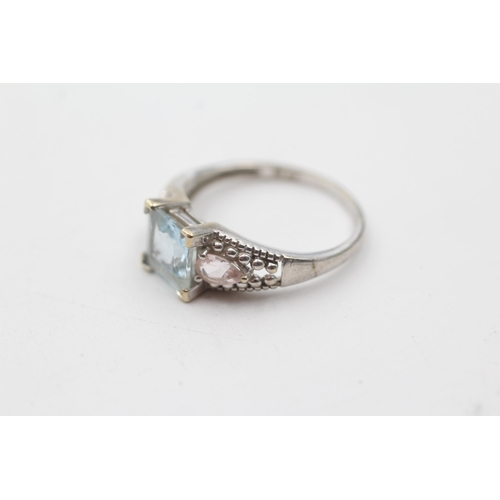 197 - 9ct white gold diamond, aquamarine, and pink gemstone dress ring (2.6g) size  P