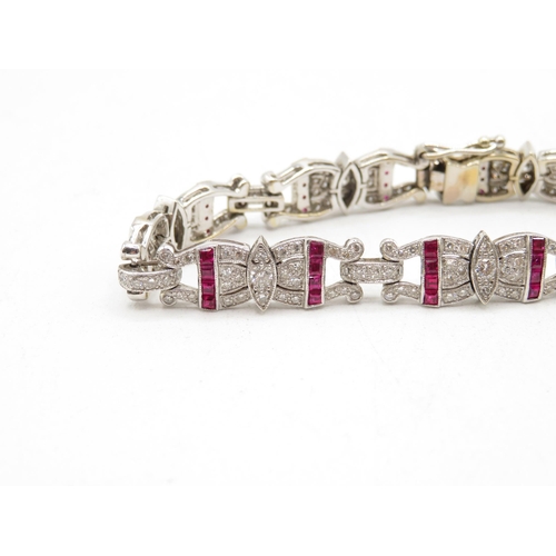 202 - 18ct white gold ruby and diamond bracelet from 1940s fully HM tight safety clasp in excellent condit... 