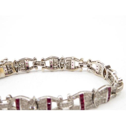 202 - 18ct white gold ruby and diamond bracelet from 1940s fully HM tight safety clasp in excellent condit... 