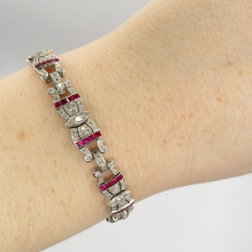 202 - 18ct white gold ruby and diamond bracelet from 1940s fully HM tight safety clasp in excellent condit... 