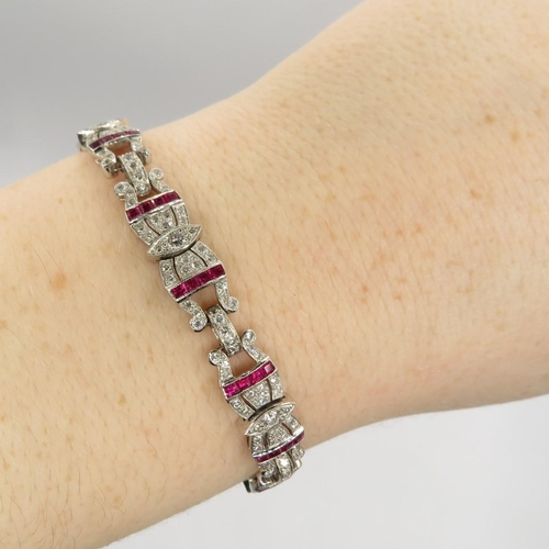 202 - 18ct white gold ruby and diamond bracelet from 1940s fully HM tight safety clasp in excellent condit... 