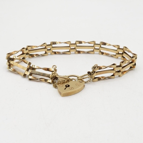 205 - 9ct gold 3 bar gate bracelet with lock and safety chain  7.5