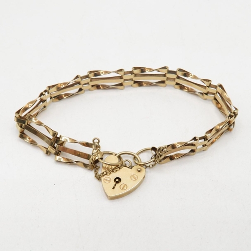 205 - 9ct gold 3 bar gate bracelet with lock and safety chain  7.5