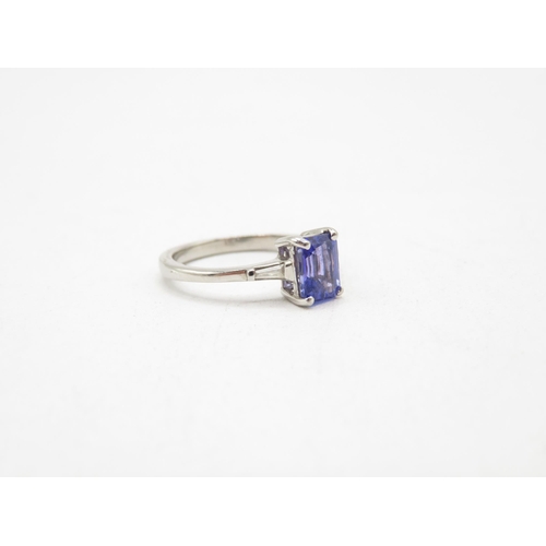 209 - Rhapsody 950 platinum AAAA Tanzanite ring 7x5mm spread creating 1.1ct Tanzanite.  Total weight 4g Si... 