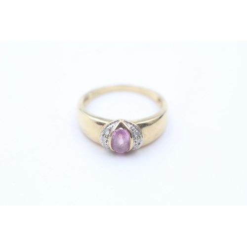 21 - 9ct gold diamond and pink sapphire oval dress ring (2.7g) size  M