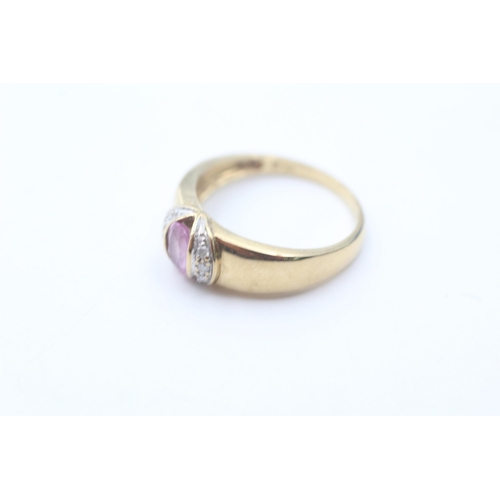 21 - 9ct gold diamond and pink sapphire oval dress ring (2.7g) size  M