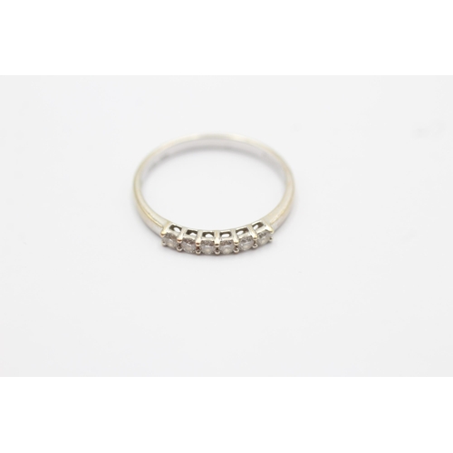 22 - 9ct white gold diamond half eternity ring (1.2g) size  M