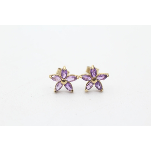 28 - 2 x 9ct gold paired amethyst and pink gemstone flower stud earrings (1.7g)