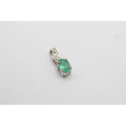 29 - 2 x 9ct gold pendants inc. diamond, opal, emerald (0.9g)