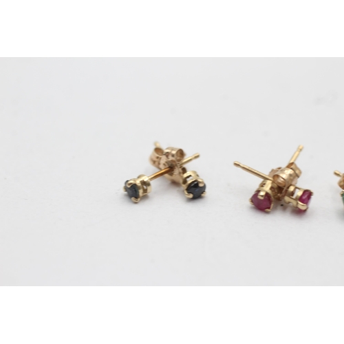 30 - 3 x 9ct gold paired stud earrings inc. ruby, sapphire, and emerald (1.1g)