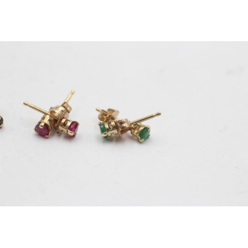 30 - 3 x 9ct gold paired stud earrings inc. ruby, sapphire, and emerald (1.1g)