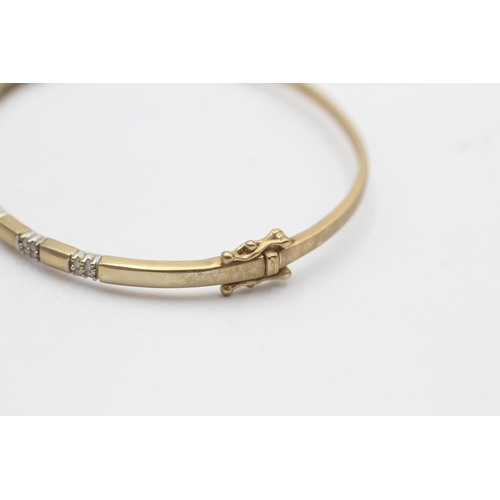 35 - 9ct gold bangle with diamond spacers (8.5g)