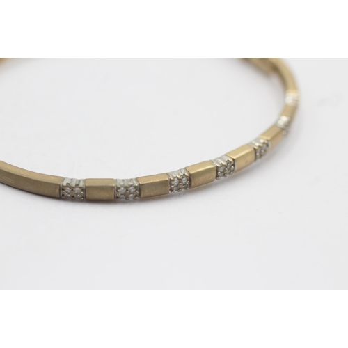 35 - 9ct gold bangle with diamond spacers (8.5g)