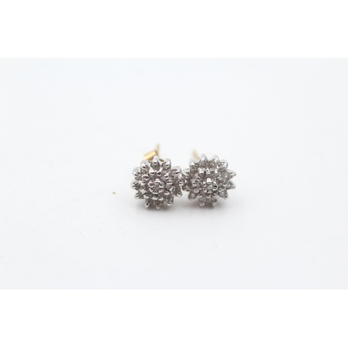 37 - 2 x 9ct gold diamond cluster paired earrings (2.5g)