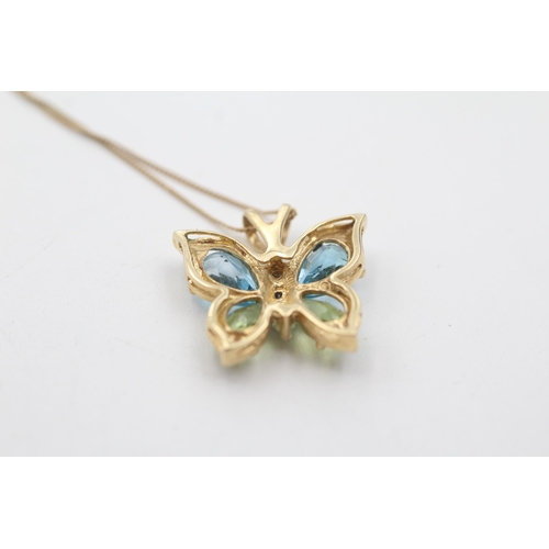 66 - 9ct gold diamond, topaz and peridot butterfly pendant necklace (2.9g)