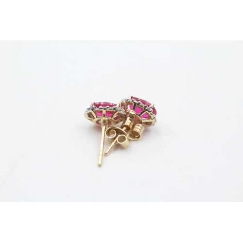 82 - 9ct gold diamond & synthetic ruby stud earrings - as seen (1.3g)