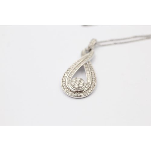 87 - 9ct white gold diamond pendant necklace (3.6g)