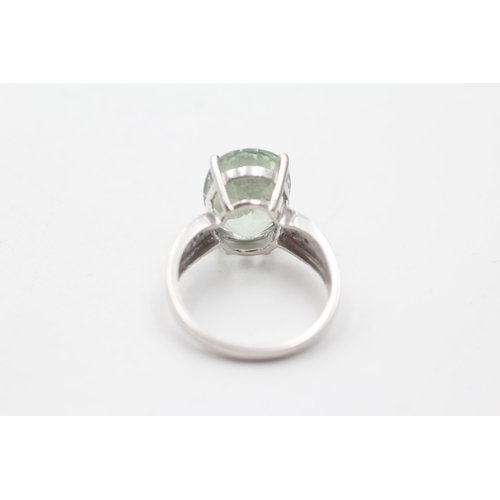 92 - 9ct white gold diamond & prasiolite shoulder set ring (5.7g)