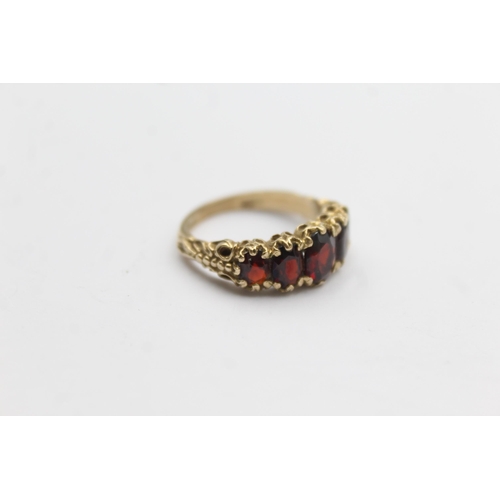 104 - 9ct Gold Garnet Five Stone Ring (4g)Size N