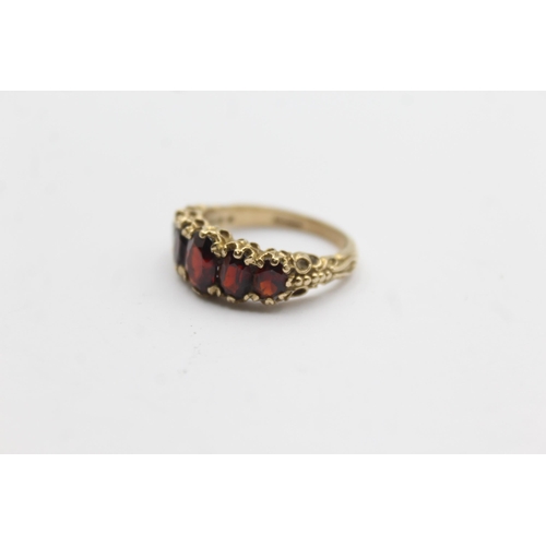 104 - 9ct Gold Garnet Five Stone Ring (4g)Size N