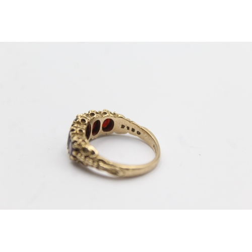 104 - 9ct Gold Garnet Five Stone Ring (4g)Size N