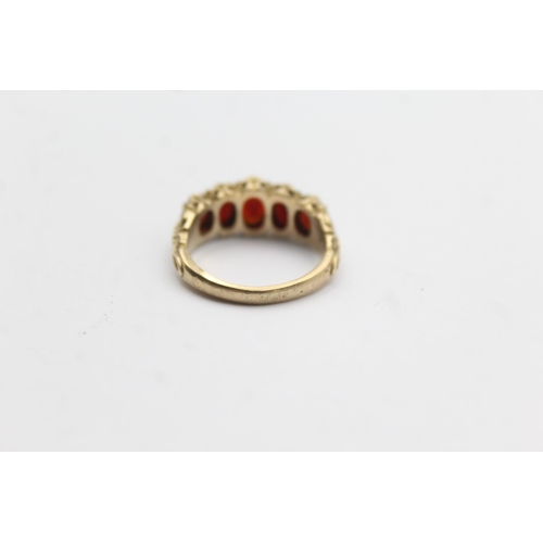 104 - 9ct Gold Garnet Five Stone Ring (4g)Size N