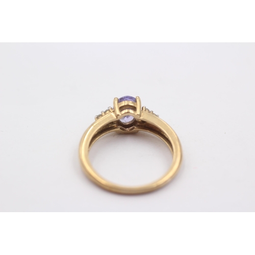 16 - 9ct Gold Diamond And Oval Tanzanite Seven Stone Ring (3.2g)Size O