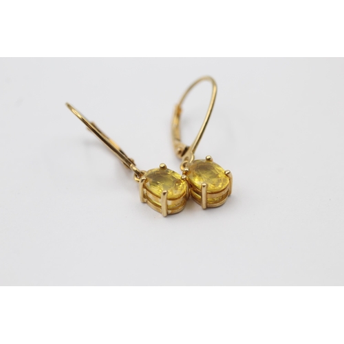 33 - 2 X 9ct Gold Paired Gemstone Earrings Inc. Citrine & Yellow Gemstone (2.1g)