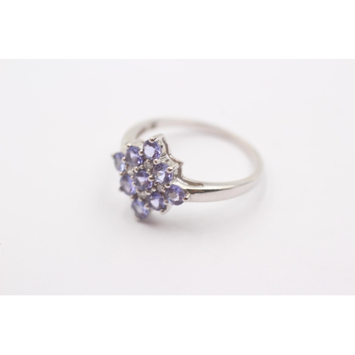 39 - 9ct White Gold Diamond And Tanzanite Cluster Ring (2.7g)Size E