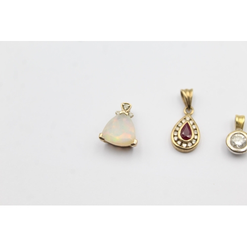 4 - 4 X 9ct Gold Gemstone Pendants Inc. Diamond, Opal, Ruby (3.7g)