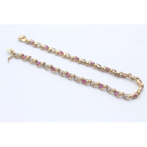 40 - 9ct Gold Diamond And Ruby Twist Bracelet (5.7g)