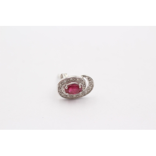 44 - 9ct White Gold Ruby And Diamond Halo Stud Earrings (1.4g)