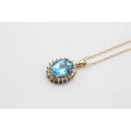 46 - 9ct Gold Topaz And White Gemstone Halo Pendant On Chain (2.4g)