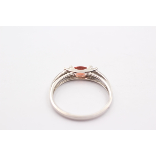 48 - 9ct White Gold Orange Gemstone And Diamond Tension Setting Ring (1.9g)Size O