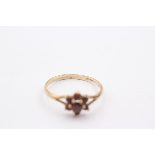 51 - 9ct Gold Garnet Halo Ring (1.4g)Size O