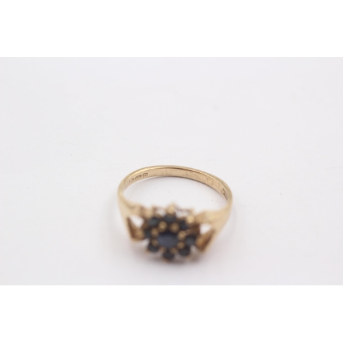 56 - 9ct Gold Sapphire Starburst Ring (2.3g)Size N