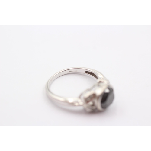 58 - 9ct White Gold Diamond And Black Gemstone Ring (4.3g)Size N