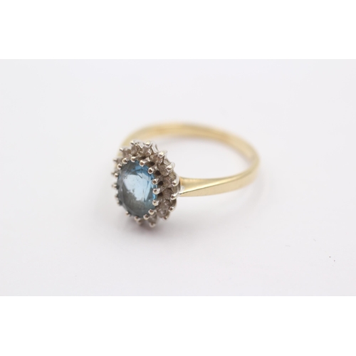 64 - 9ct Gold Blue Topaz & Diamond Halo Statement Ring (2.7g)Size M