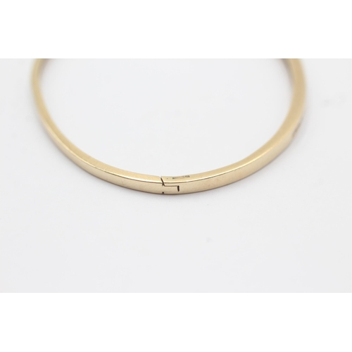 31 - 10ct Gold Diamond Channel Set Half Eternity Hinged Bangle Bracelet (7.5g)