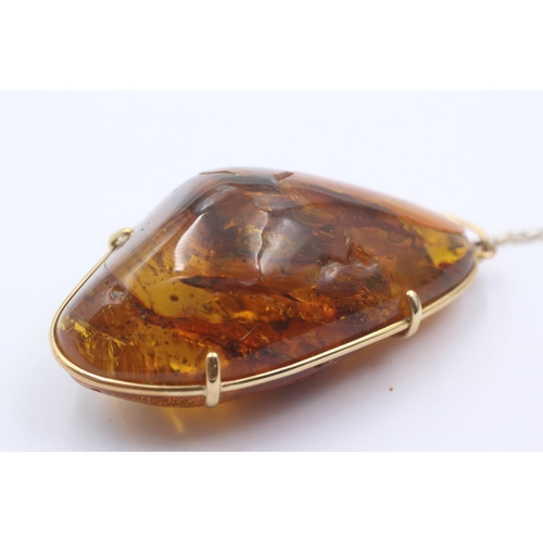 34 - 14ct Gold Amber Weighty Nugget Pendant Necklace (35.1g)