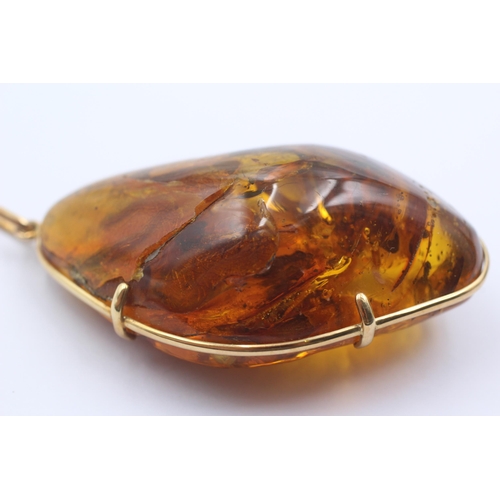 34 - 14ct Gold Amber Weighty Nugget Pendant Necklace (35.1g)