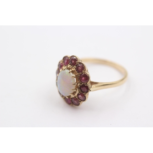 9 - 9ct Gold Oval Opal And Ruby Halo Cluster Dress Ring (3.6g) Size Q